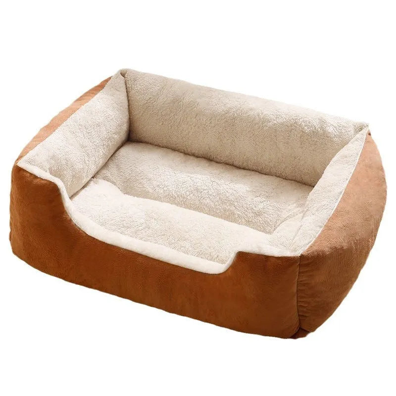 Soft short plush cat bed in grey, shown in a medium size for scale with a cat.