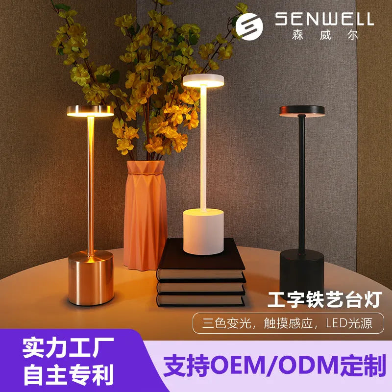 Modern minimalist table lamp with iron I-shaped frame and silver finish, LED ambient light for bedroom or bar