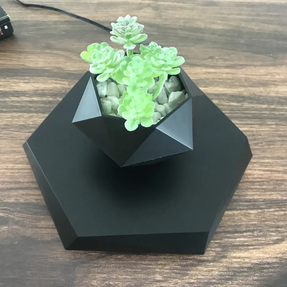 Hexagonal wood grain magnetic levitating flower pot floating above base