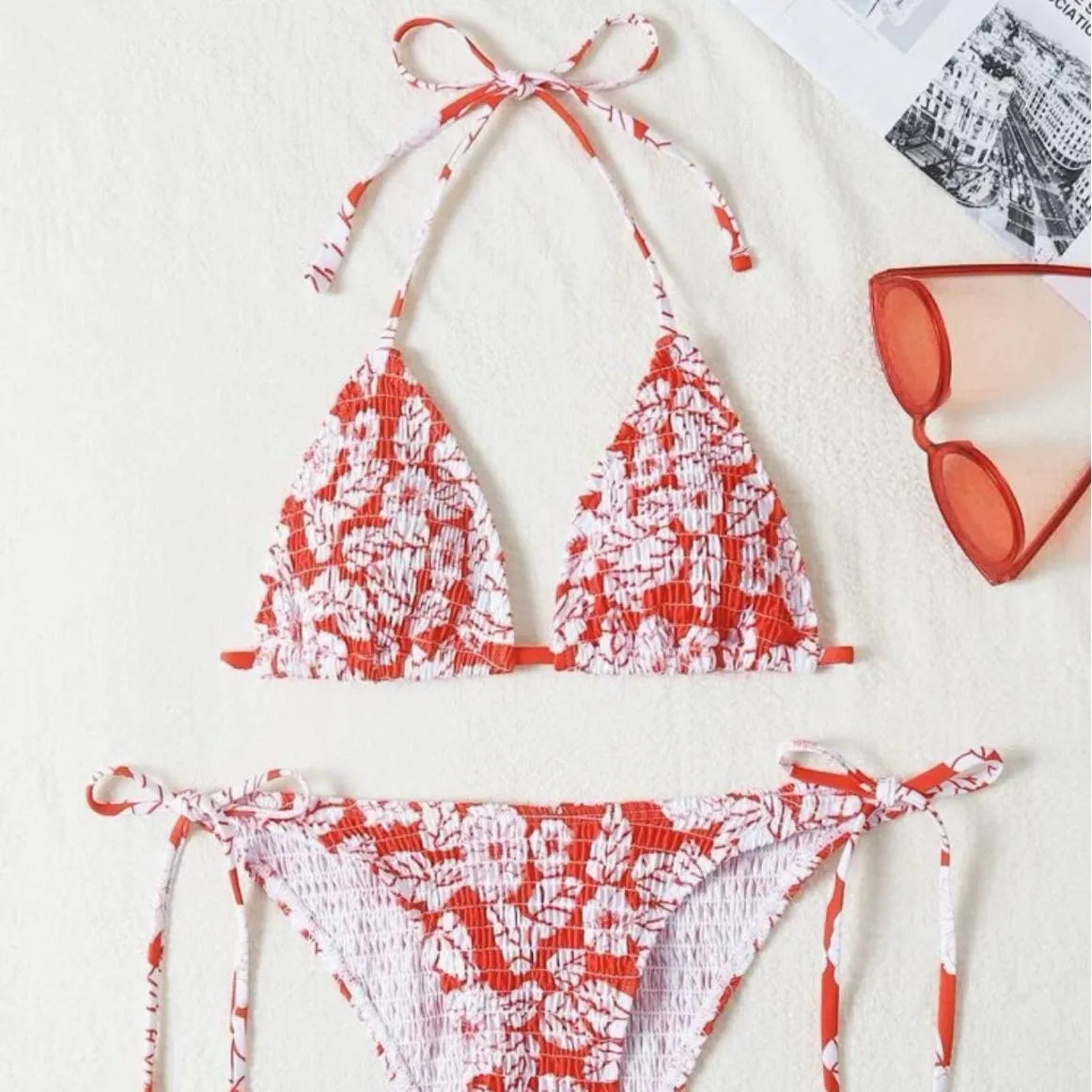 Women's floral print halter swimsuit set in light blue colour with briefs style