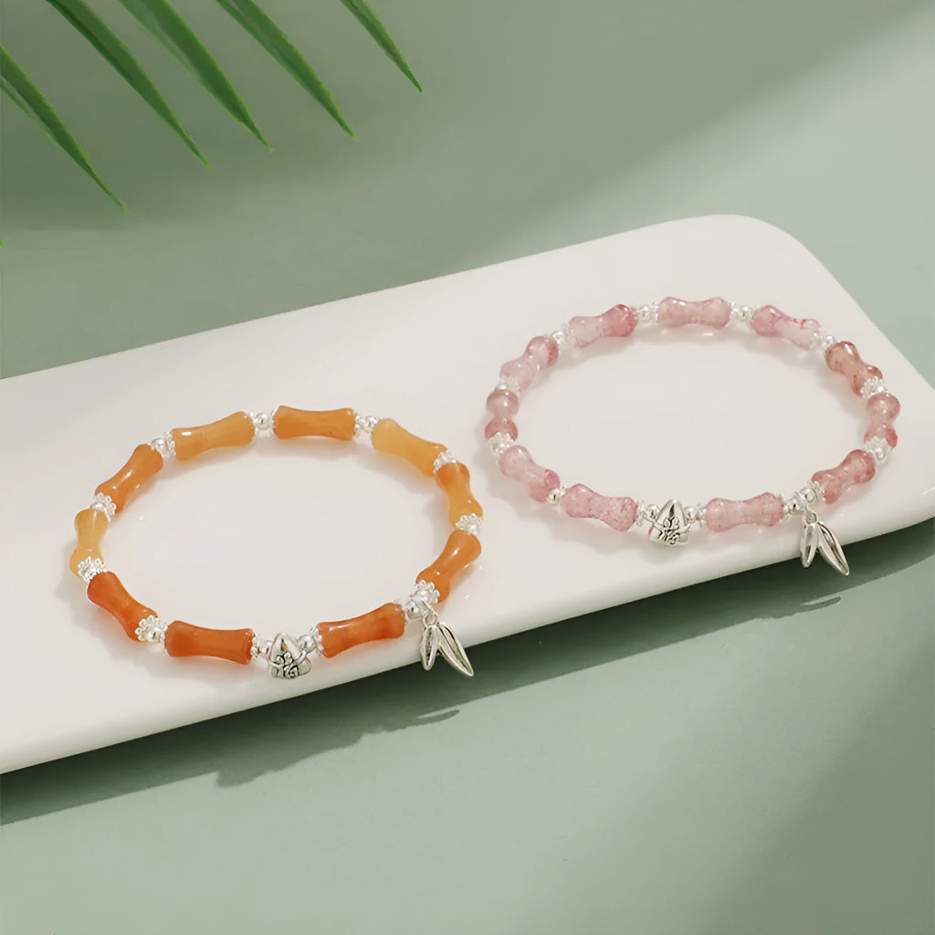 Green aventurine bamboo strawberry crystal bracelet with electroplated finish on adjustable elastic cord