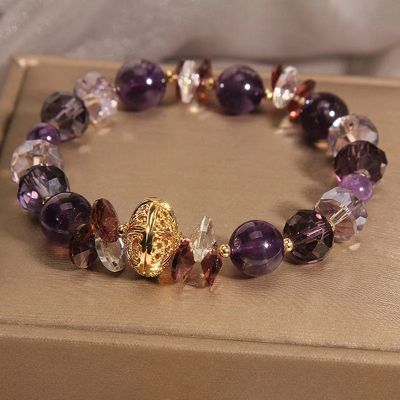 Purple crystal bracelet with pumpkin beads and wind chime lucky charm design for women