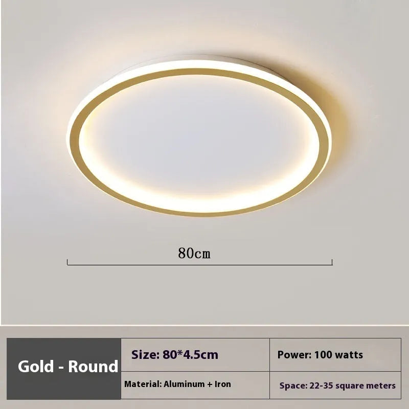 Modern circular minimalist LED ceiling lamp in black finish, shown mounted on a white ceiling.
