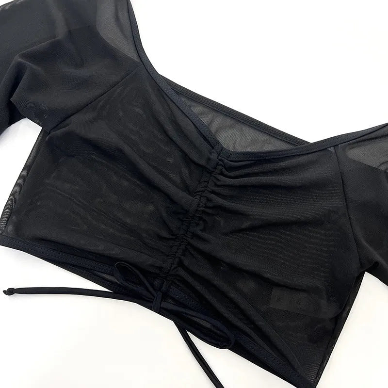 Women's black mesh four-piece bikini swimsuit with long sleeves