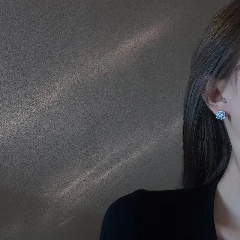 A pair of women's square geometric earrings in alloy, available in silver or gold colour options.