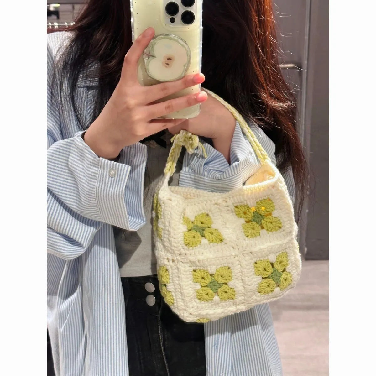 Handmade cotton crochet handbag with pink cherry blossom design and magnetic buckle