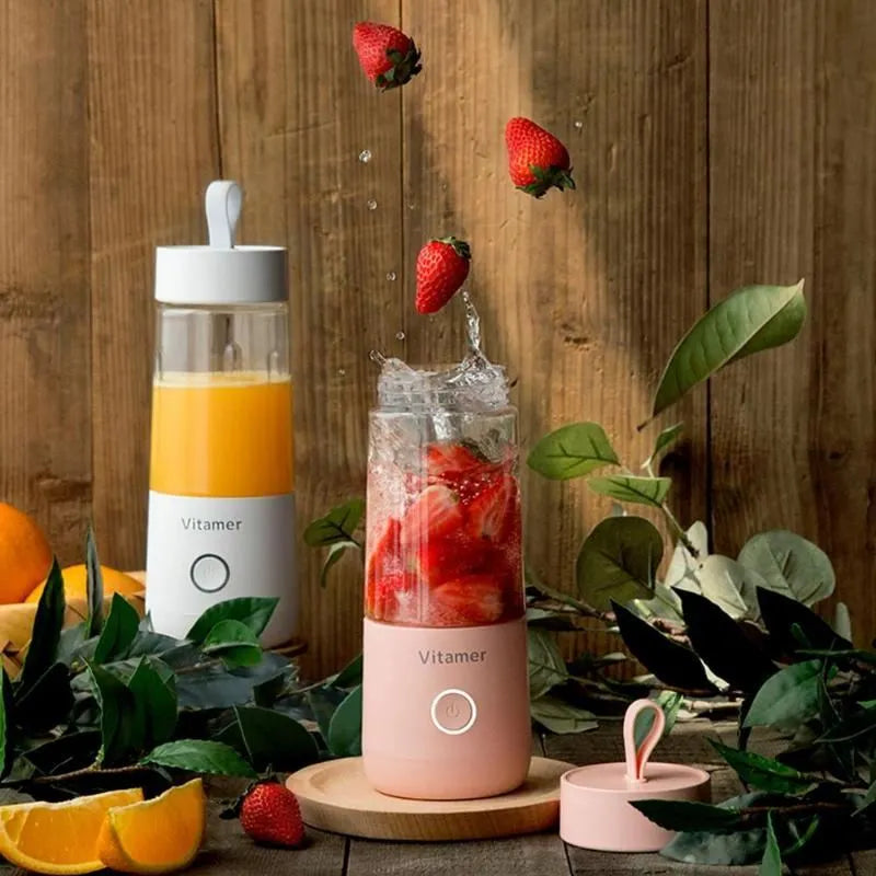 White portable USB rechargeable blender bottle with silicone carry ring, 350ml Tritan cup, and stainless steel blades.