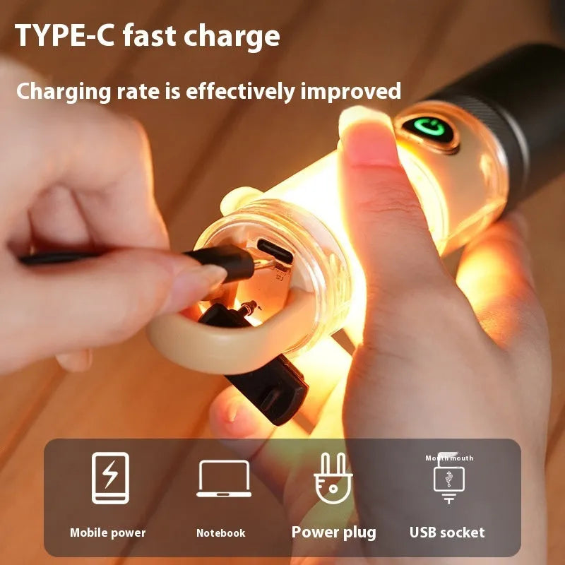 Orange and beige coloured multifunctional flashlight with keychain and optical zoom lens.