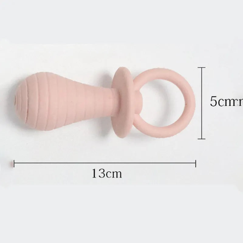 Soft TPR pacifier chew toy for puppies and kittens in blue, with internal squeaker.