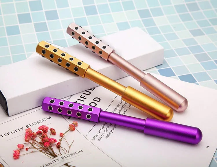 Purple germanium particles facial massage roller 193mm long with rounded ends