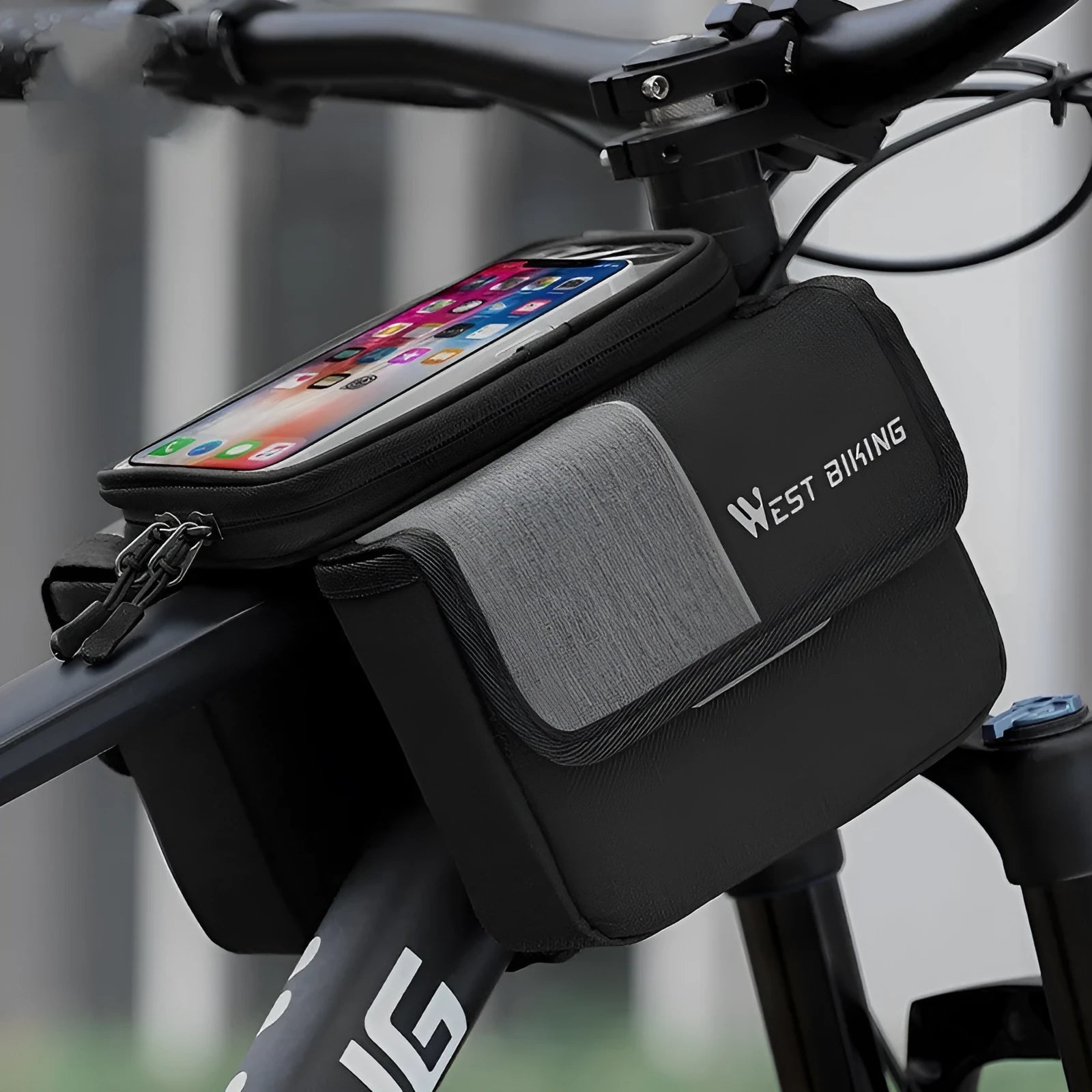 Black and grey Oxford cloth cycling saddle bag mounted on a bike handlebar.