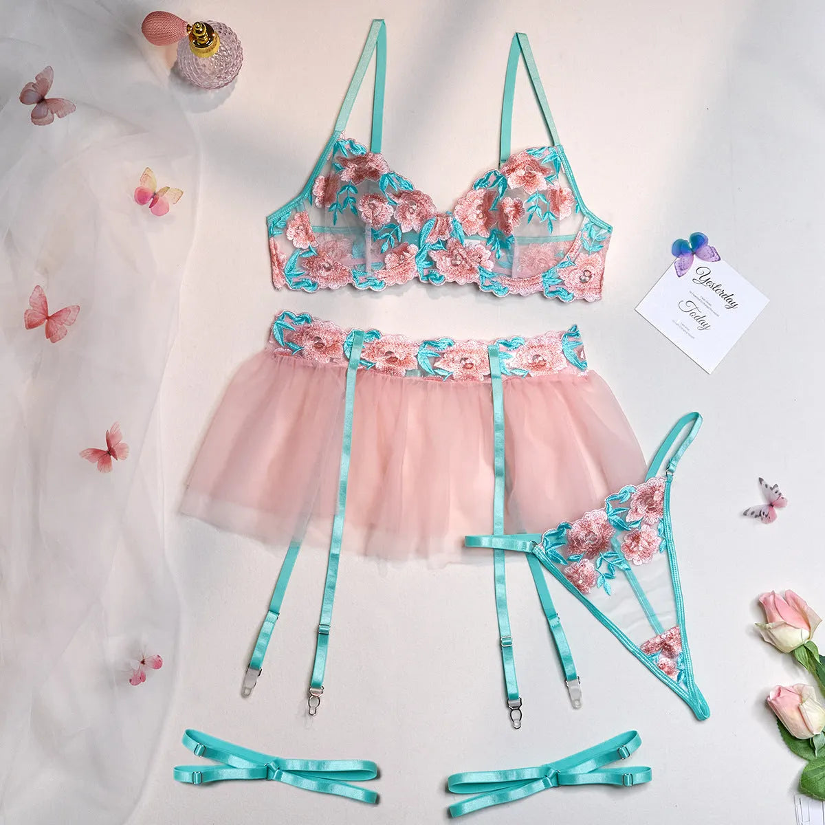Pink women's mesh pettiskirt suit with embroidery detail and matching bikini set