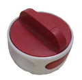 Green stainless steel bottle opener gadget for screw-top lids on a kitchen counter.