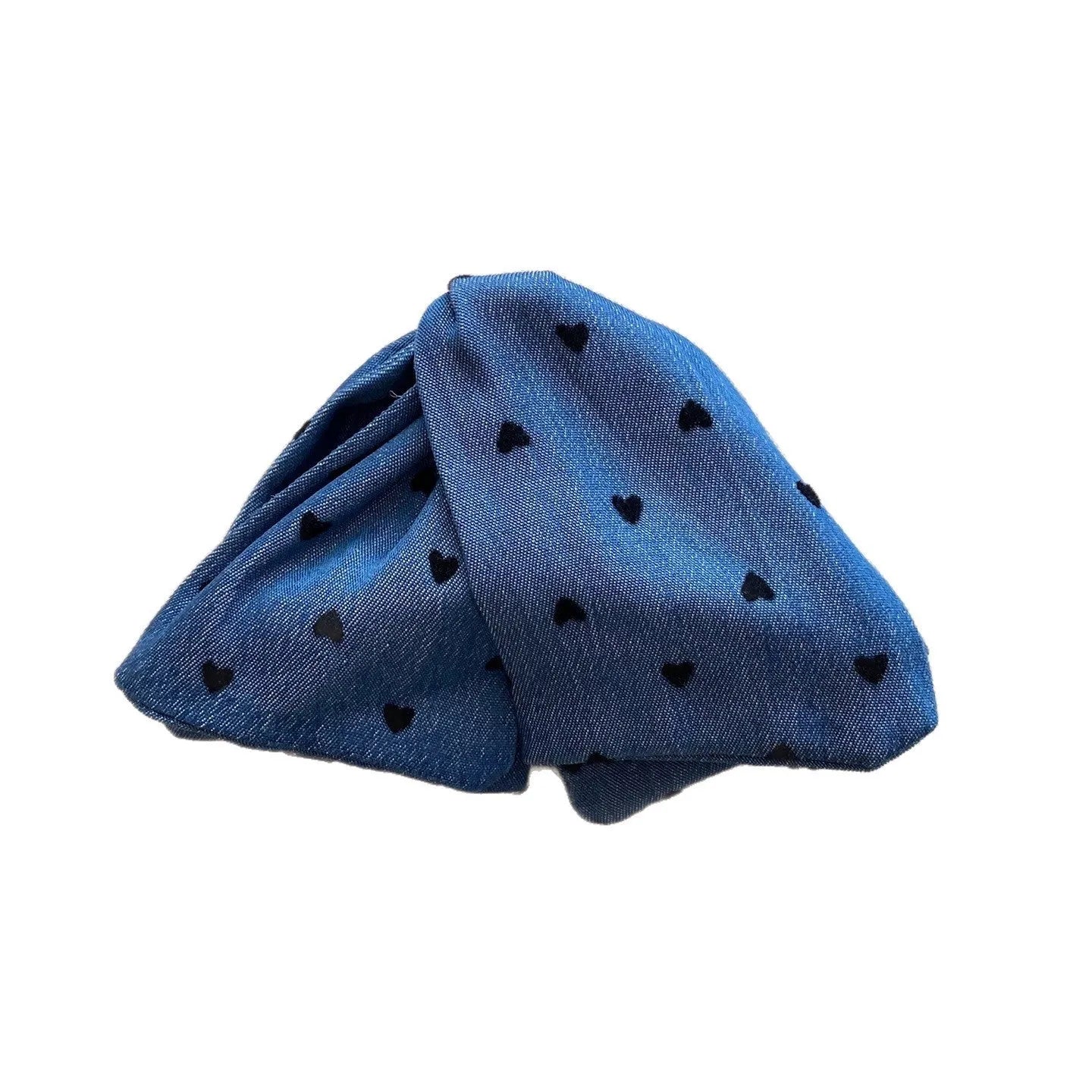 Handmade triangle grip hair clip with denim bow detailing in fabric and acrylic