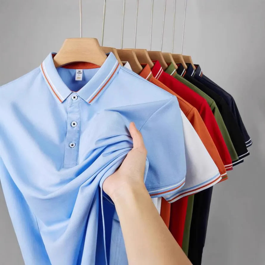 Men's slim fit cotton blend polo shirt with collar and short sleeves on a hanger.