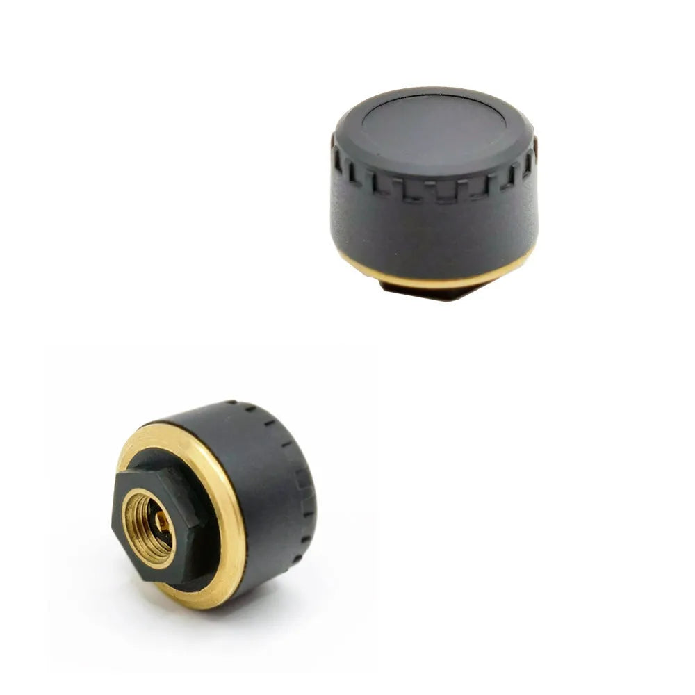 Four black Bluetooth tyre pressure sensors for car with mobile phone display showing pressure readings