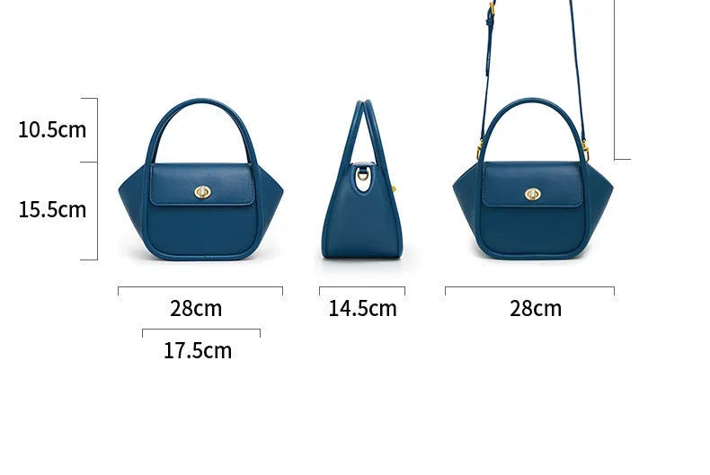 Women's leather wing tote bag in cow leather with a cross-body strap and buckle detail.