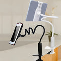 Black flexible mount holder showing bendable arm and suction base holding a tablet at an angle