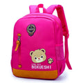 Cartoon bear school backpack for children in deep blue and mei red colours