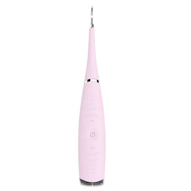 Pink and blue electric dental scaler tool with silicone handle on a bathroom counter.