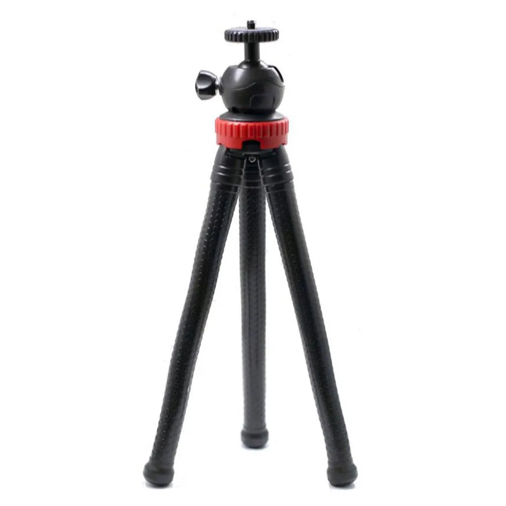 Black octopus tripod with spherical gimbal head wrapped around pole supporting mobile phone