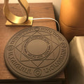 Square black 10W fast wireless charging pad with glowing magic array pattern for Qi phones