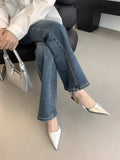 Thin low heel strap pointed leather shoes in black, red, brown, and silver colour options showing rubber soles