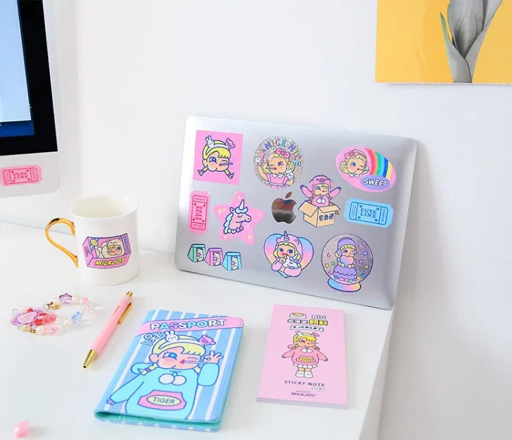 Cartoon sticker set showing 16 square PVC decals and storage box with cute girl and comic designs.