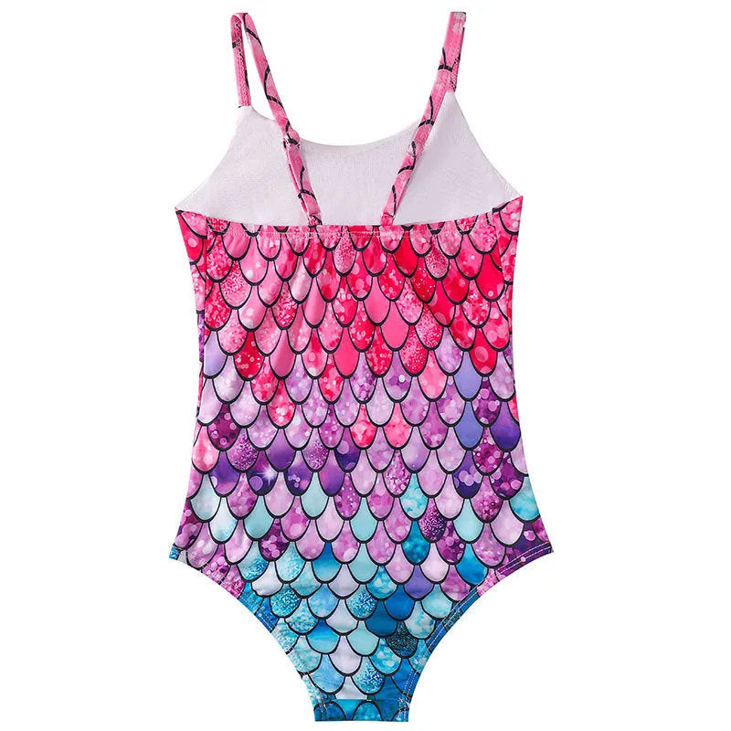 A girl wearing a turquoise mermaid one-piece swimsuit, showing the briefs style and high-elasticity fit.
