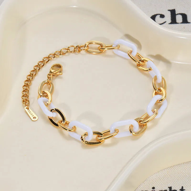 Women's stainless steel resin bracelet with double-layer loving heart design and heart-shaped pendant
