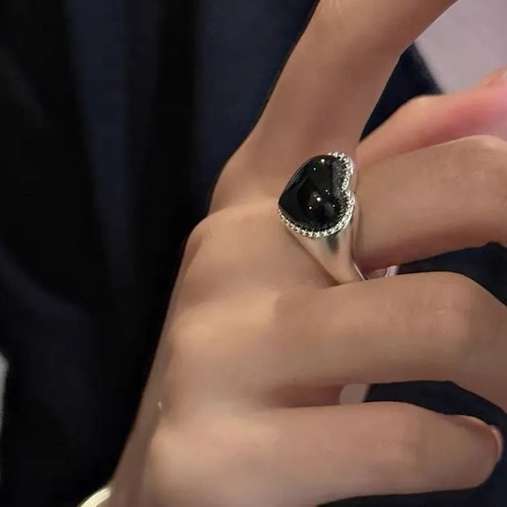 Adjustable open mouth ring with black agate stone and heart design in sterling silver