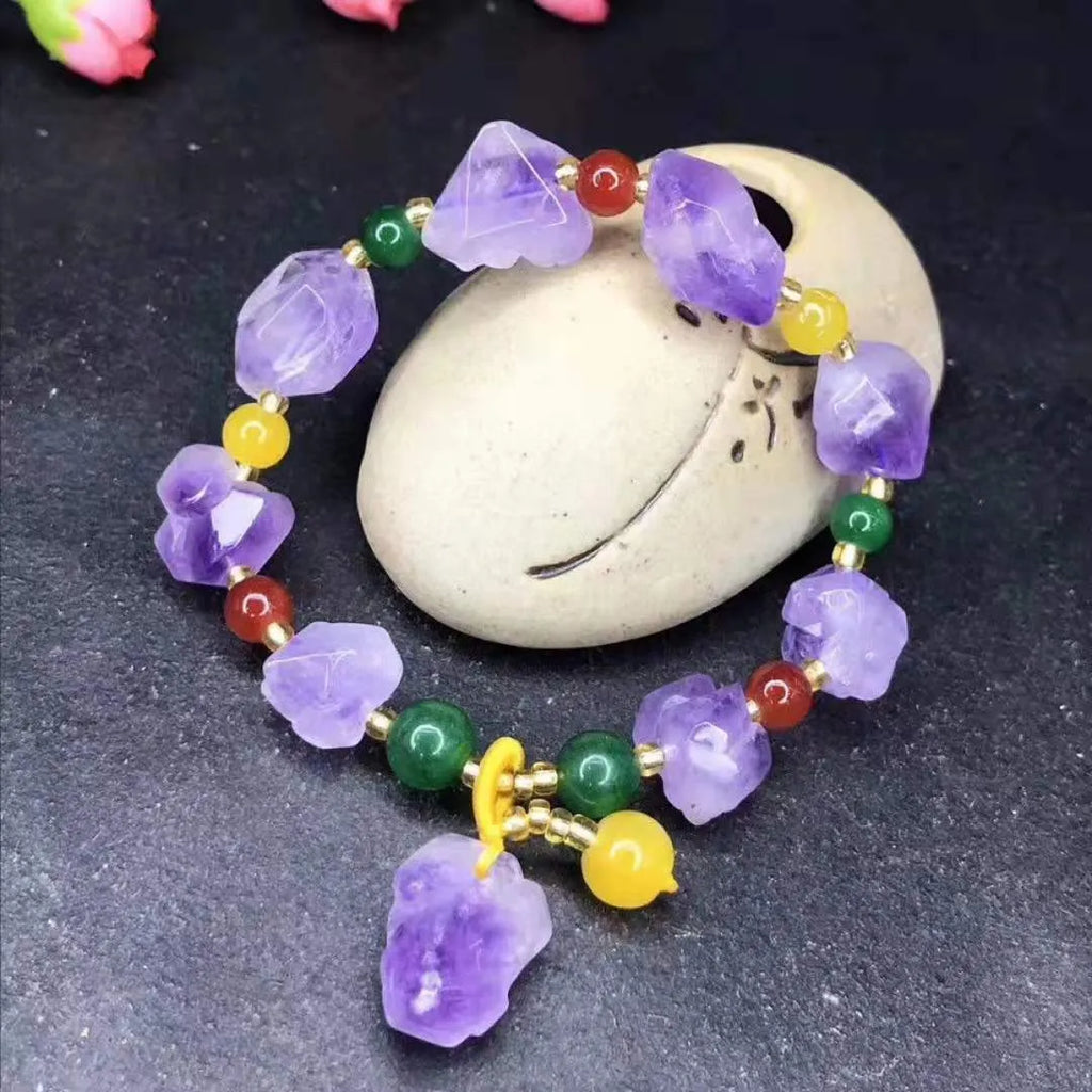 Women's natural amethyst bracelet featuring a Fu character bead and amethyst-shaped beads.