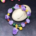 Women's natural amethyst bracelet featuring a Fu character bead and amethyst-shaped beads.