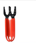 Orange adjustable pipe wrench with serrated jaw, shown gripping a metal pipe.