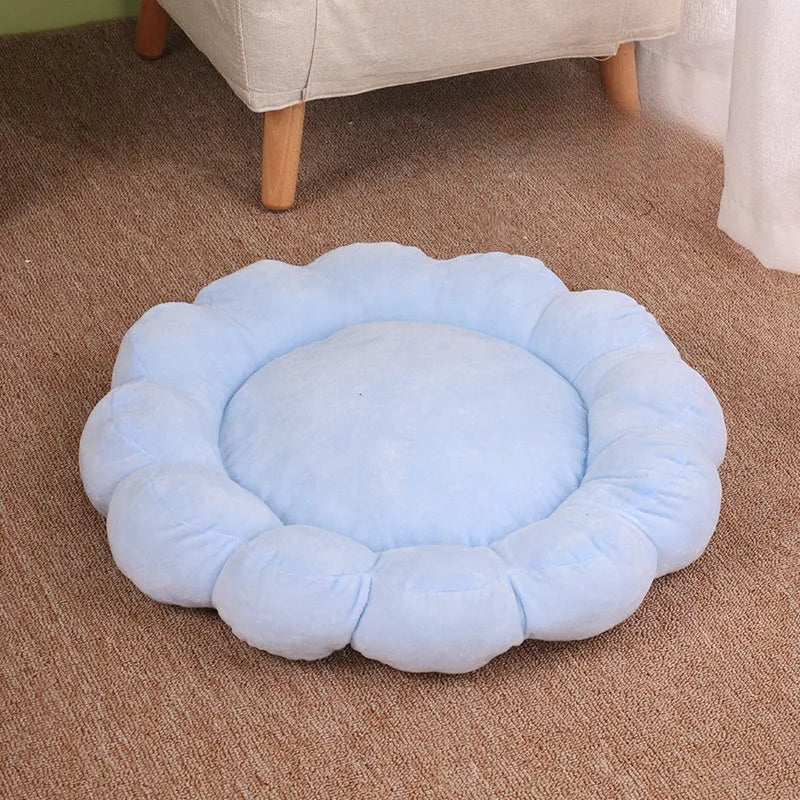 Square blue pet bed cushion with a half-surrounded side and short plush fabric