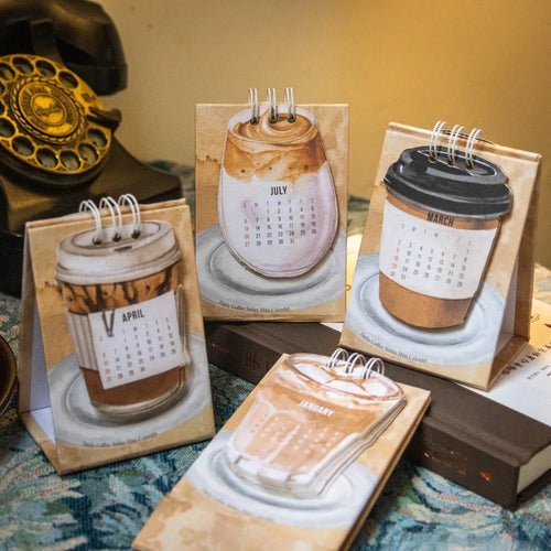 2025 mini desk calendar set showing four different paper calendar designs including Coffee Time theme