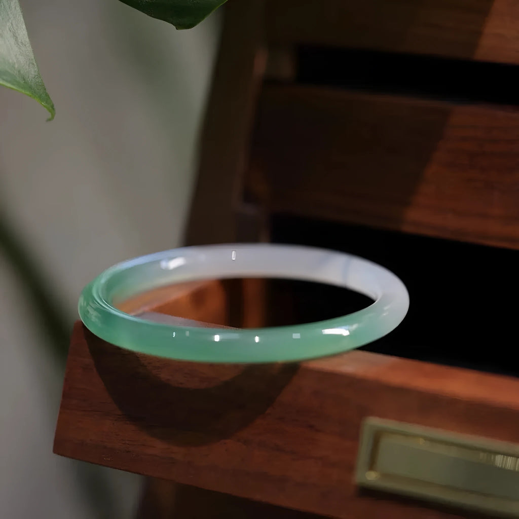 Chalcedony jade bracelet showing semi-translucent stone material in traditional bangle design
