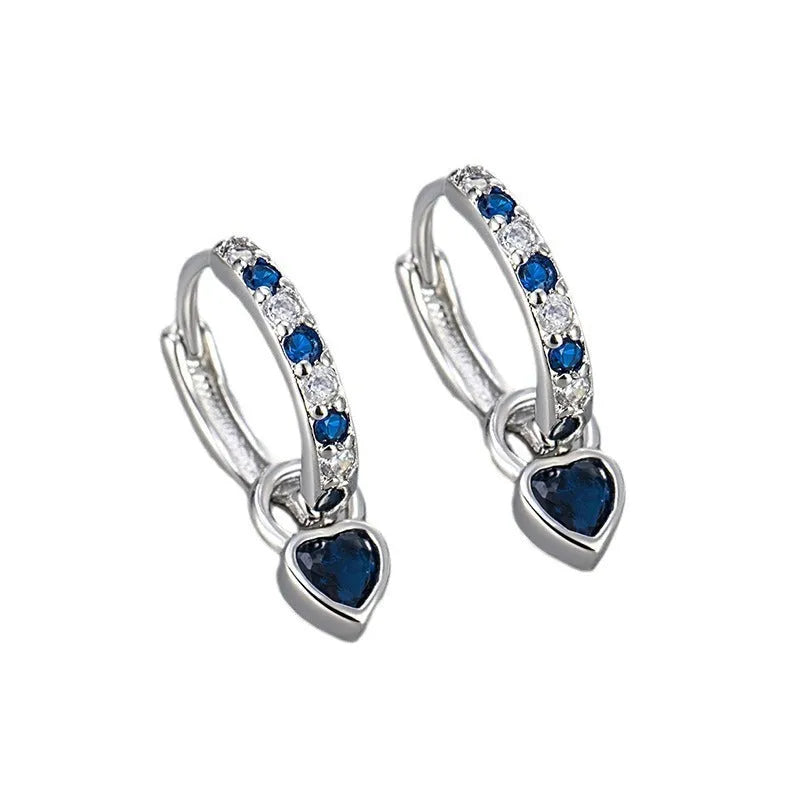 Women's heart-shaped drop earring with a dangling coloured stone, available in gold or white gold plating.