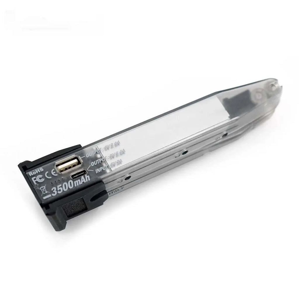 Transparent tactical power bank with decorative bullet clips showing 3500mAh PD3.0 charging