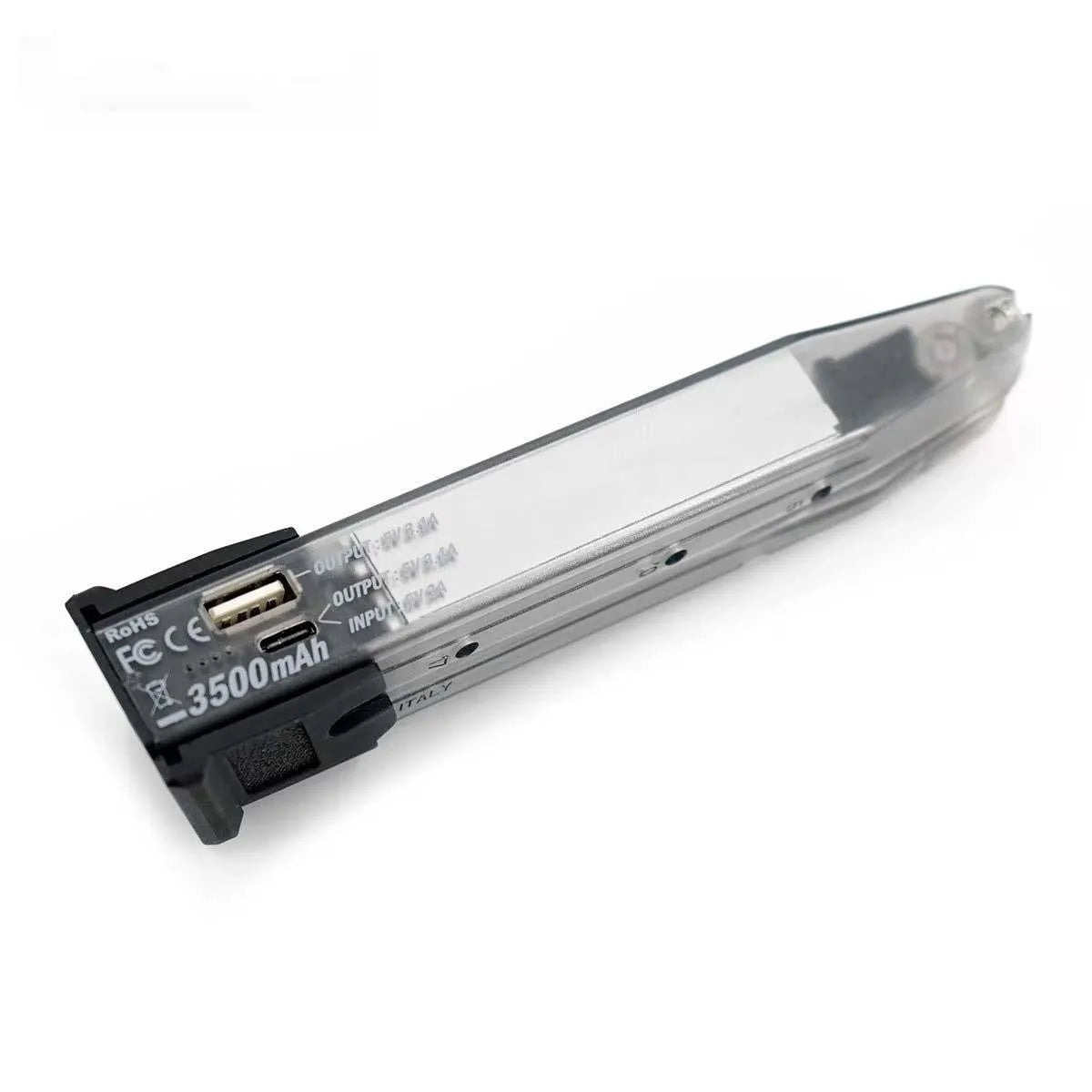 Transparent tactical power bank with decorative bullet clips showing 3500mAh PD3.0 charging