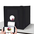 60cm LED photo studio box kit in black with foldable tent, built-in light panel, and backdrop for product photography