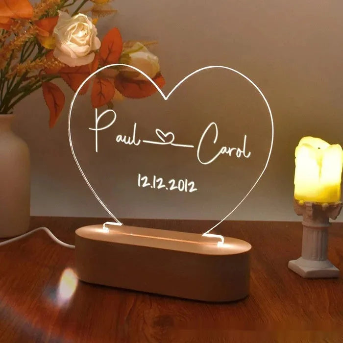 Personalised acrylic night light displaying custom names and date for Valentine's Day gift.