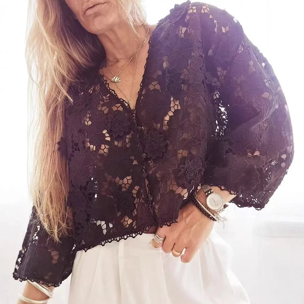 Loose V-neck cardigan with a 3D lace flower decoration in white.