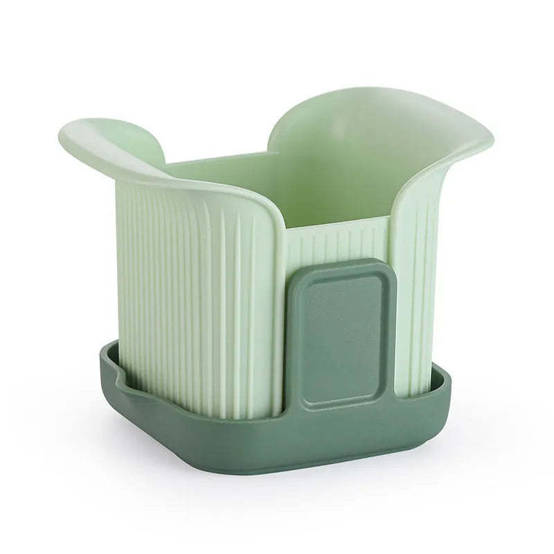 Green handheld multi-functional vegetable chopper with stainless steel blades for onions and potatoes