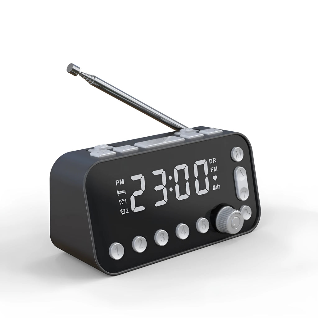 Black DAB bedside alarm clock with large LED display, pigtail antenna, and USB ports on the side.