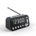 Black DAB bedside alarm clock with large LED display, pigtail antenna, and USB ports on the side.
