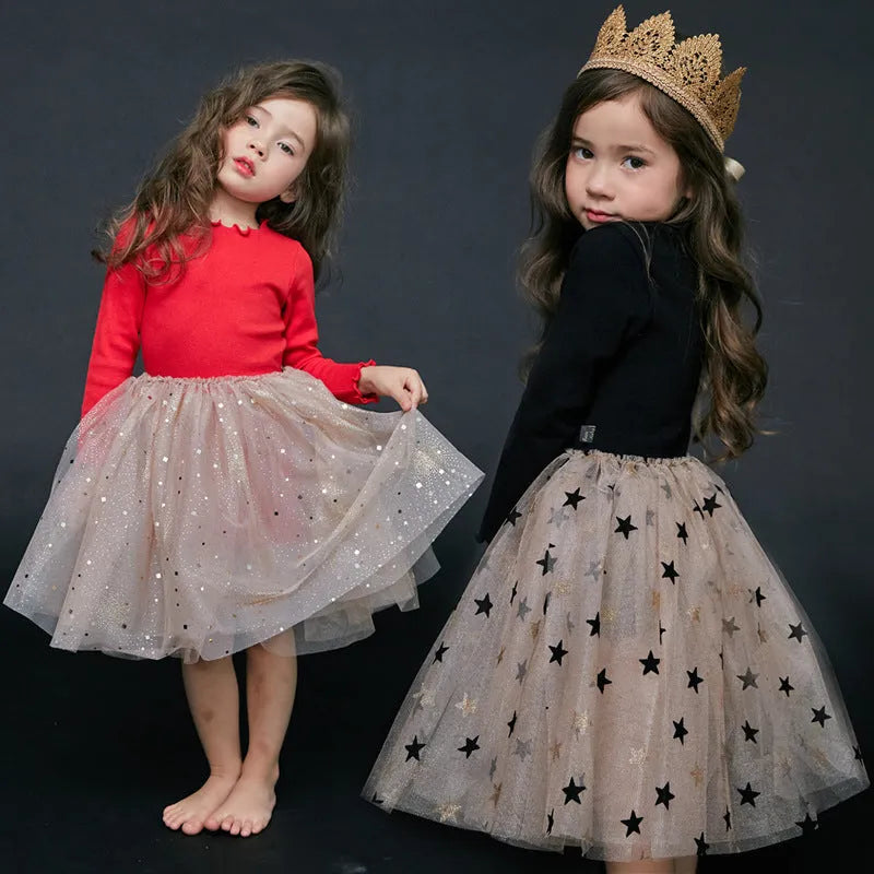 Girls red Christmas dress with long sleeves, princess skirt, and embroidered star details