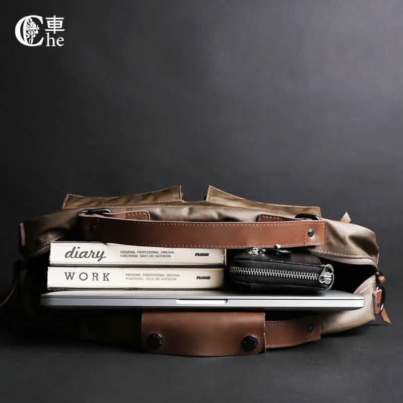 Dpark black laptop bag with a single shoulder strap, sized for a 14 or 15 inch laptop.