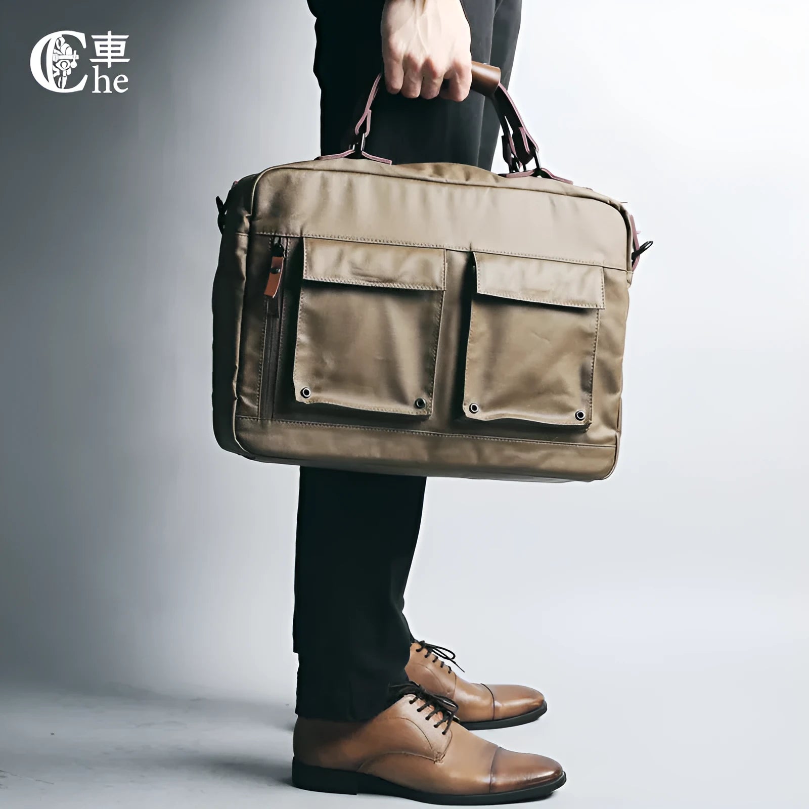 Dpark black laptop bag with a single shoulder strap, sized for a 14 or 15 inch laptop.