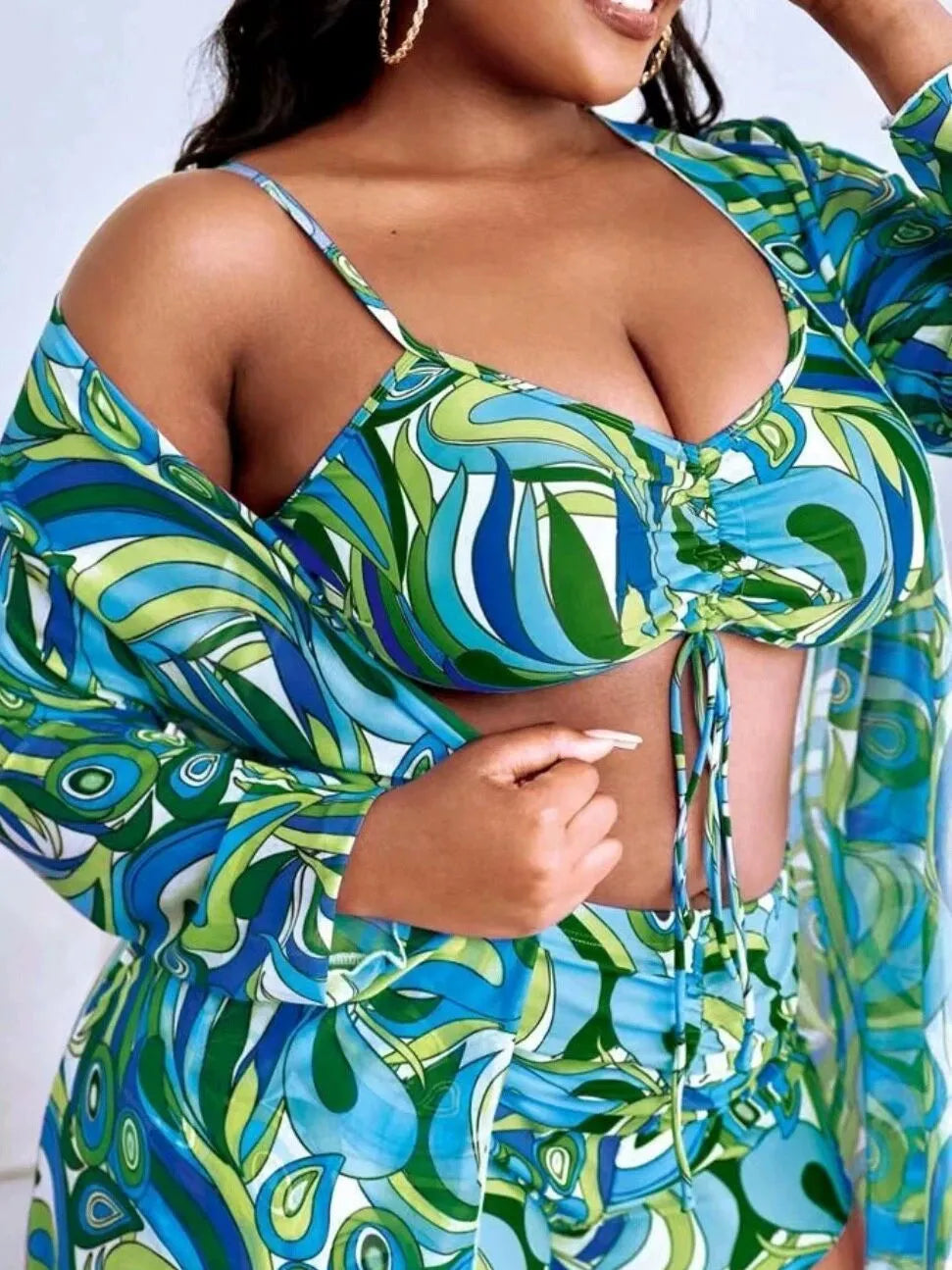 Women's floral print bikini three-piece set with cardigan cover-up in extended sizes